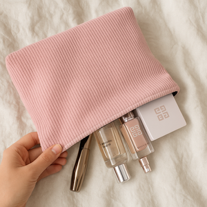 Corduroy travel pouch for beauty accessories.