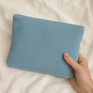 Corduroy travel pouch for beauty accessories.