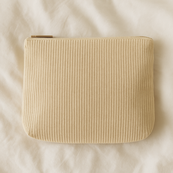 Corduroy travel pouch for beauty accessories.