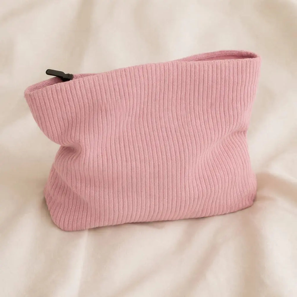 Pink toiletry bag for hair accessories and heatless curlers