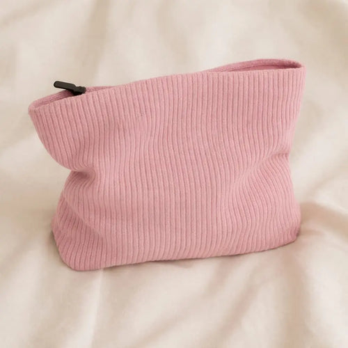 Pink toiletry bag for hair accessories and heatless curlers