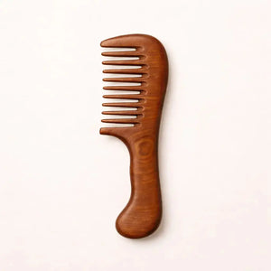 Wide tooth wooden comb for gentle detangling of curly and wavy hair