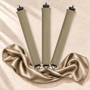 Revitalysse champagne velvet heatless curling rollers with matching satin scarf, designed to create soft, natural overnight curls without heat.