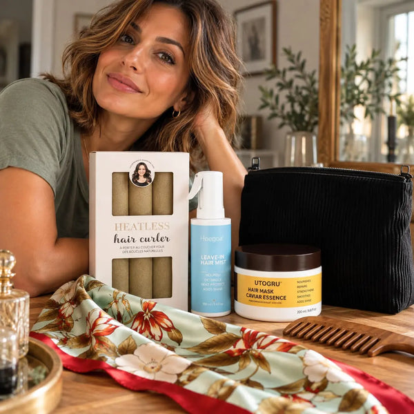 Woman with wavy hair showcasing a complete heatless curls hair care set with curling rollers, hair mist, hair mask, cosmetic pouch and wooden comb.