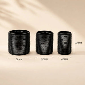 Black volume hair rollers in three diameters — 40 mm, 50 mm and 60 mm — for creating different levels of root lift and blowout-style volume.