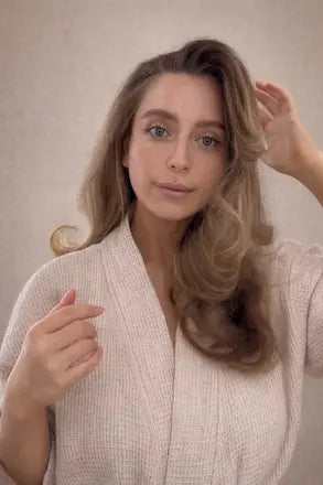 Woman with soft waves after an overnight hair routine